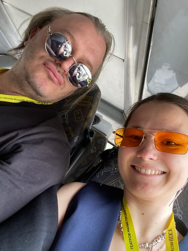 Couple takes selfie inside vehicle in Peresvet, Russia