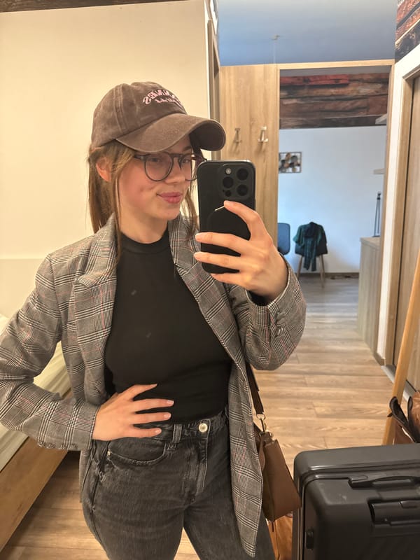 Woman documents casual afternoon with selfies in Budapest apartment