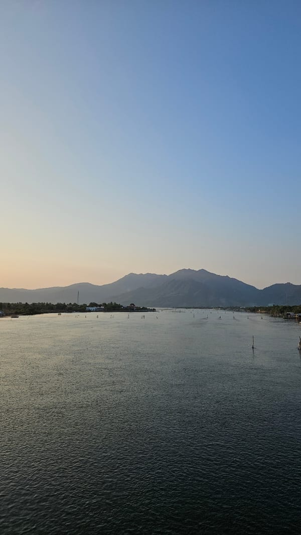 Sunset panorama captured over water body in Cam Đức