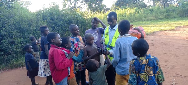 Children gather for outdoor games in Ngalula, DRC