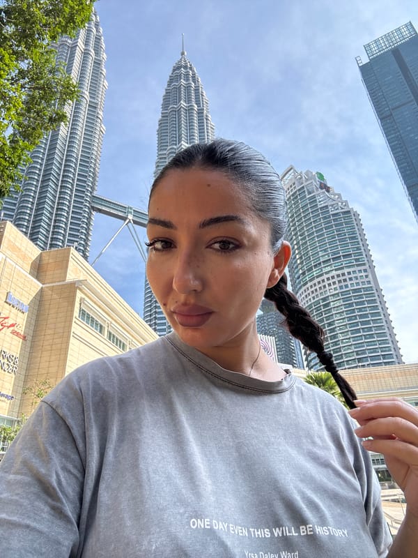 Tourist captures morning moments around Petronas Towers in Kuala Lumpur