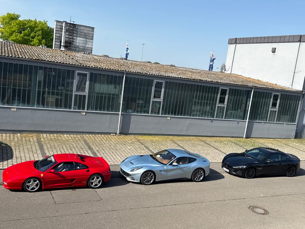 Three luxury sports cars spotted parked outside building