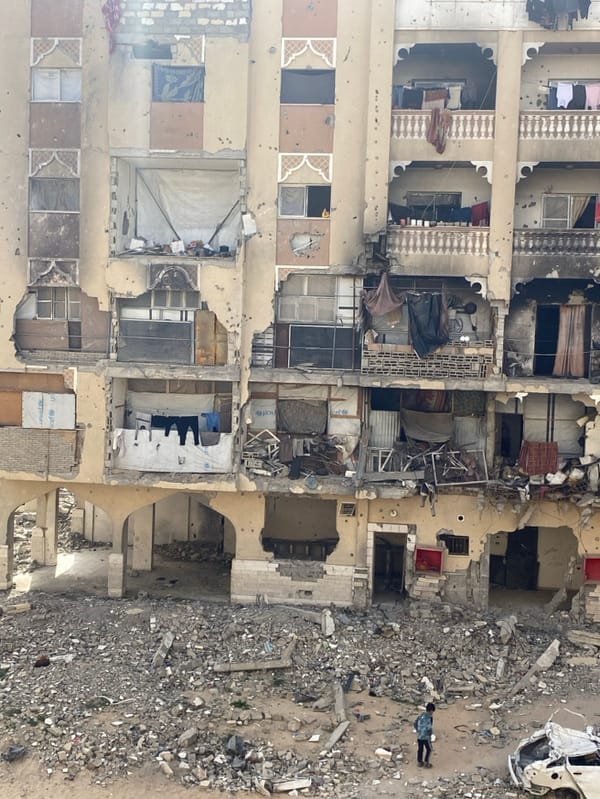 Children Navigate Rubble-Strewn Khan Yunis Amid Widespread Building Damage