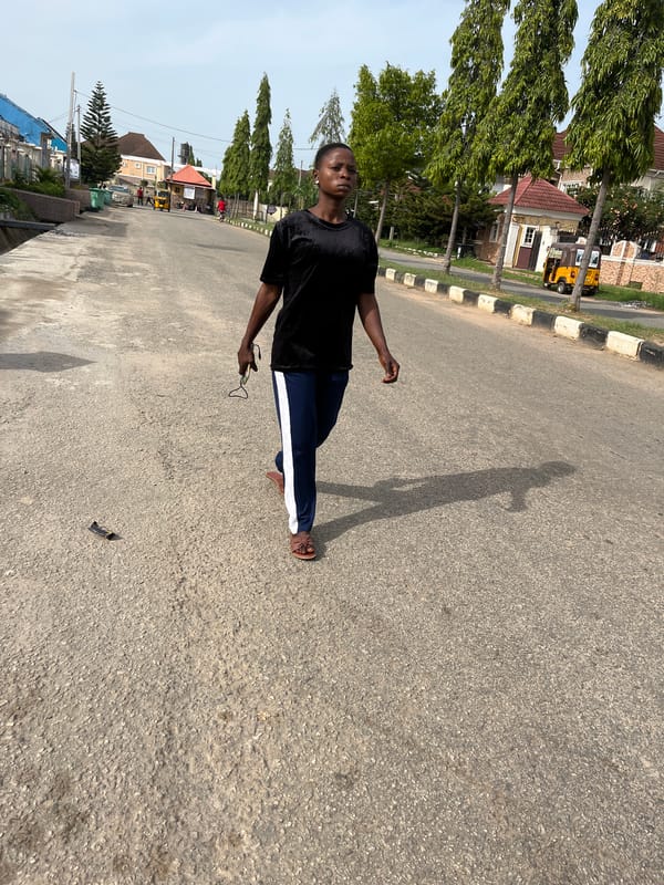Morning street life documented across Abuja residential areas