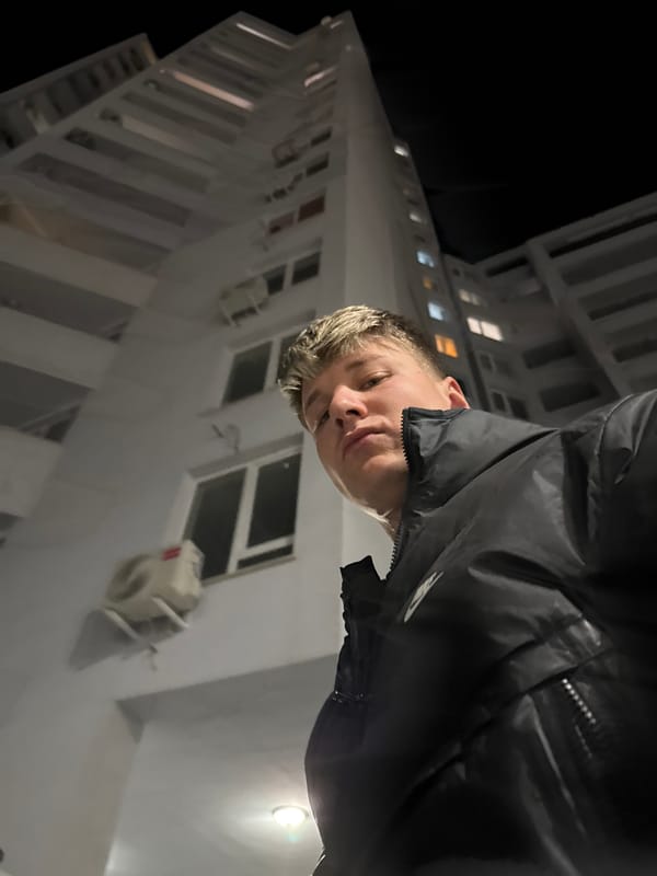 Young man takes playful selfies in Plovdiv building
