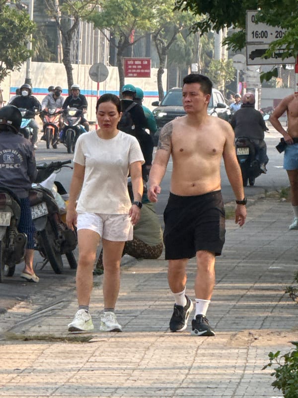 Two men spotted on sidewalk in Đà Nẵng, Vietnam