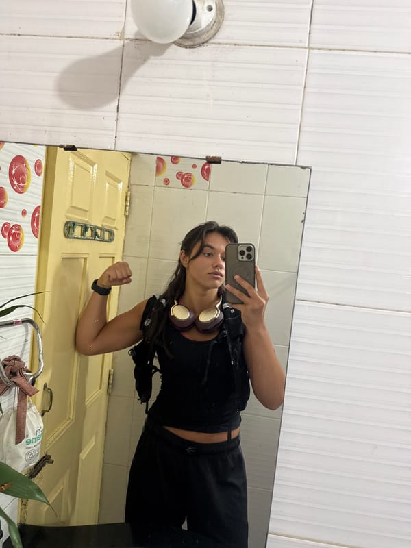 Young person takes bathroom mirror selfie in Marra, India