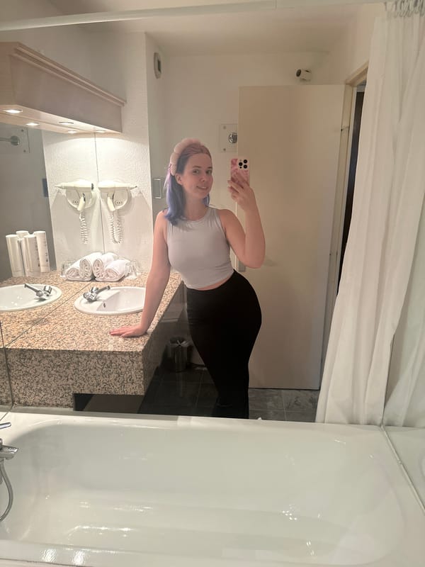 Woman takes selfies in bathroom, elevator in French suburb