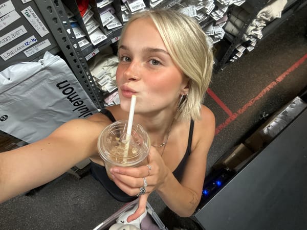 Woman takes selfie with drink in Whistler