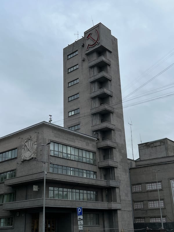 Soviet-era tower with red emblem documented in Saint Petersburg