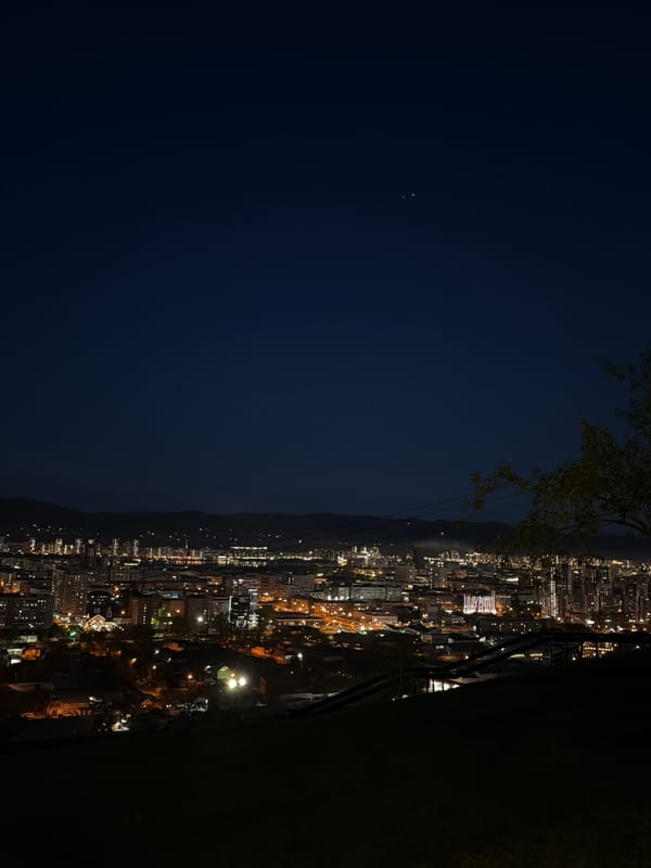 Nighttime cityscape view captured from elevated position in Krasnoyarsk