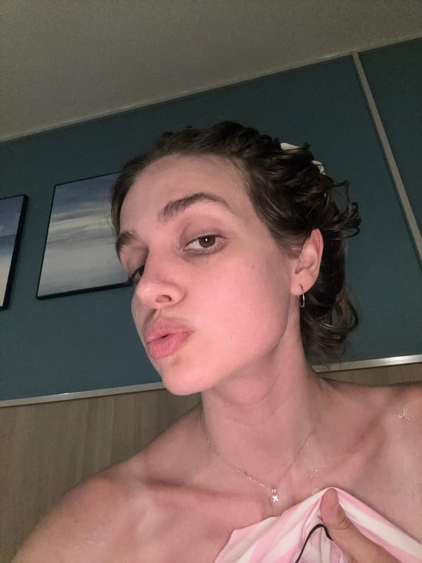 Woman takes selfies in yellow top in Patong