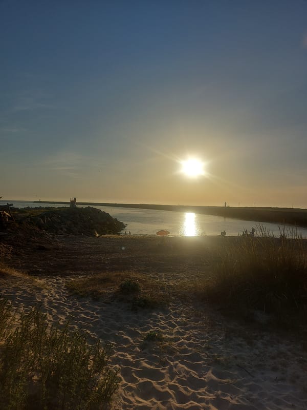 Evening sunset walk documented along Mondego River in Portugal