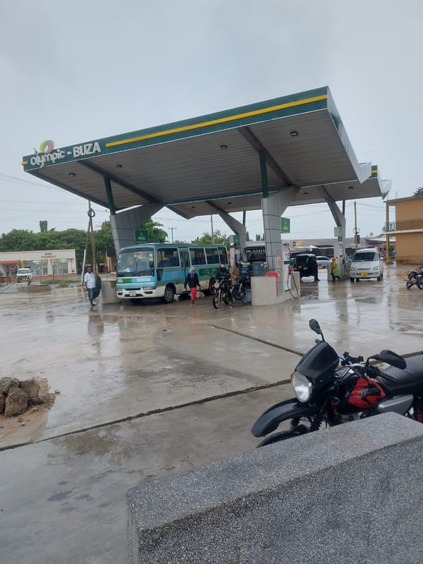 Daily life documented across wet streets of Dar es-Salaam