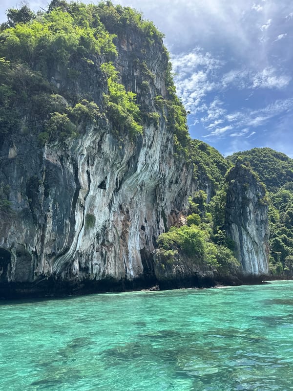 Boat tour through Ao Nang's limestone karst bay
