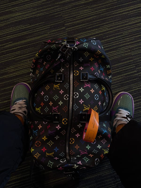 Person seated on carpet at Istanbul Airport