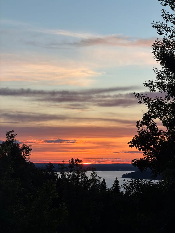 Sunset documented over water in Izhevsk, Russia