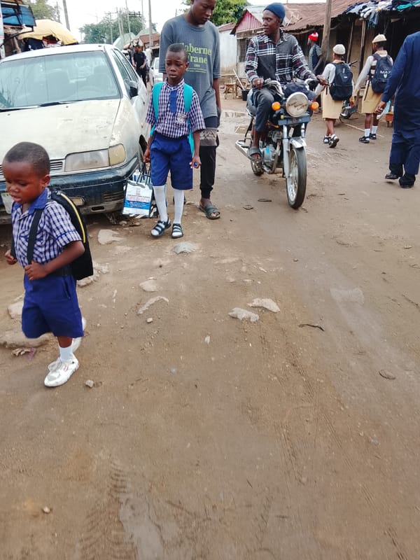 Morning street scenes documented on Abuja's unpaved roads