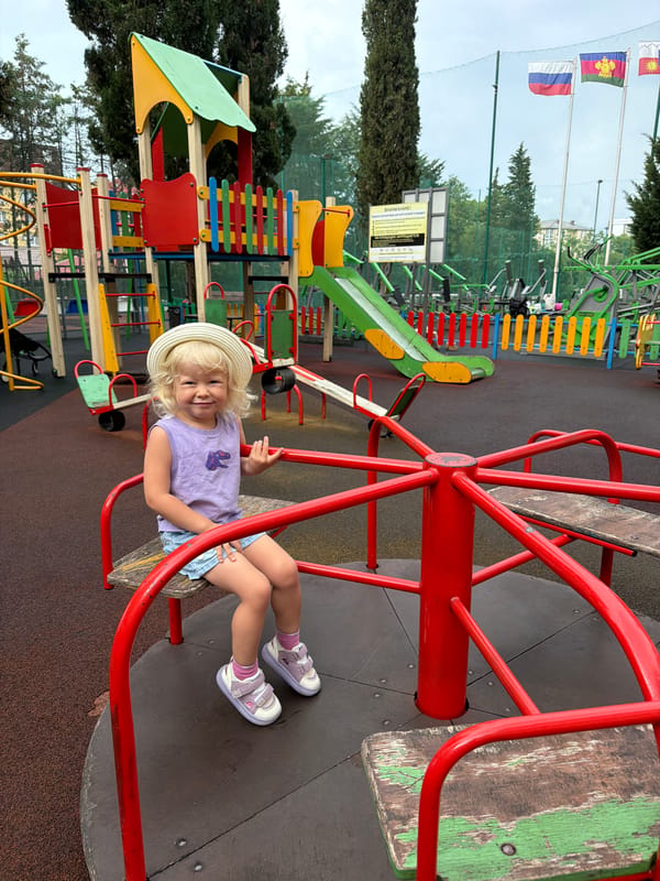 Playground morning at a Sochi park, summer 2026
