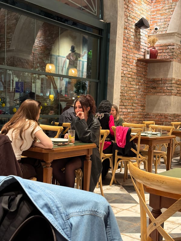 Diners captured at Yerevan restaurant during evening hours