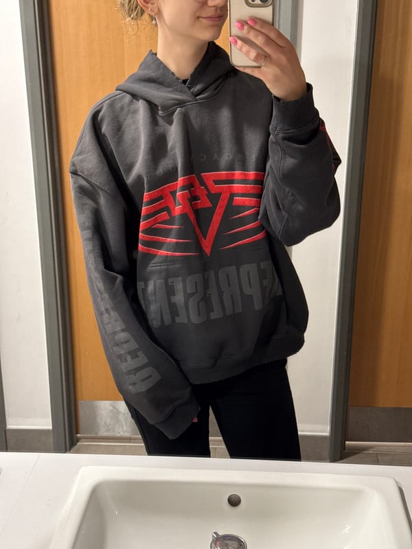 Person takes bathroom mirror selfie in Ipswich