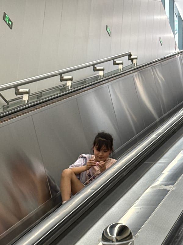 Commuters spotted at Liangjiang subway station Sunday morning