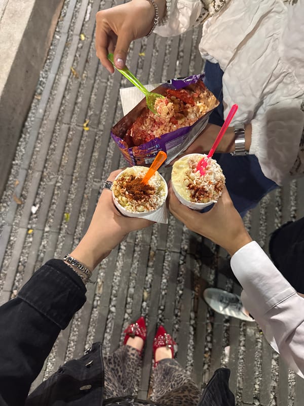 Street food vendor serves customers in Mexico City