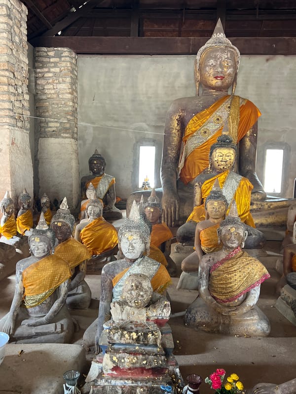 Inside a Ko Samui temple complex, Buddha statues and sacred figures