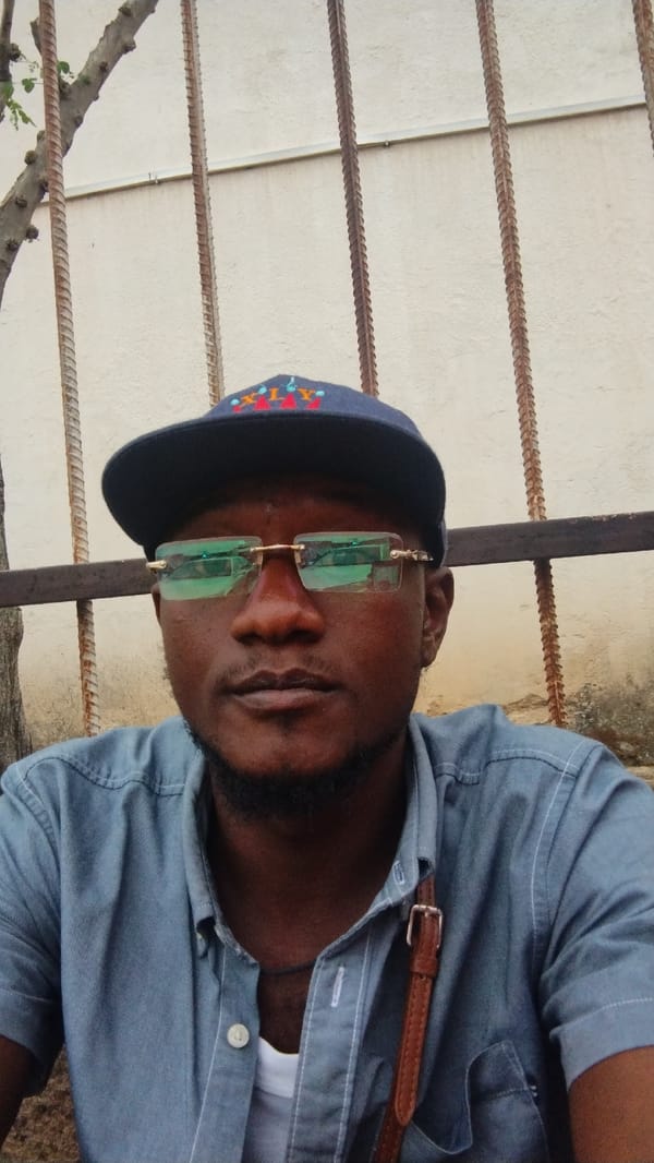 Overcast afternoon street life across central Jos, Nigeria