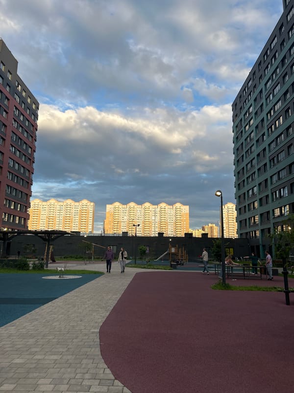 Saint Petersburg courtyard under a stormy summer sky