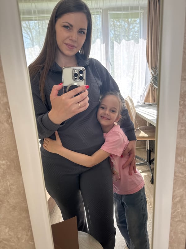 Mother and daughter share morning moments in Russian village