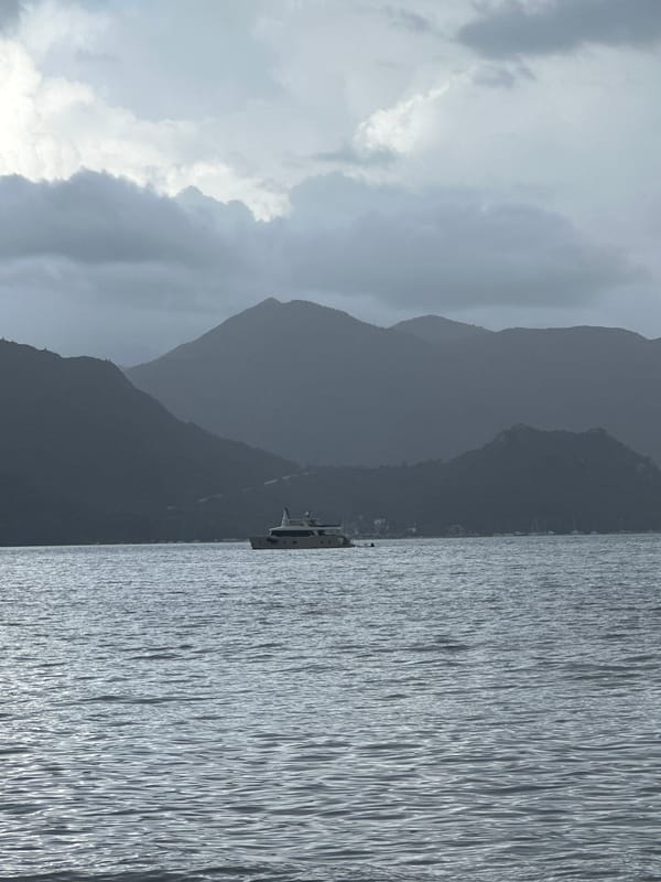Marmaris scenes: vintage coffee vehicle and coastal mountain view