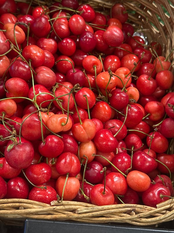 Summer market day in Moscow: fresh fruit, flowers, and a carousel