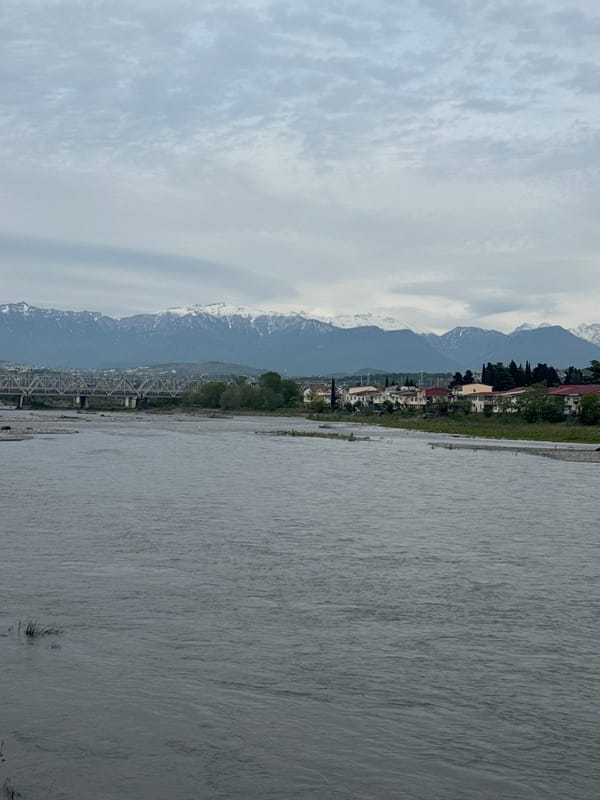 Afternoon riverside scenes captured along Sochi waterfront promenade