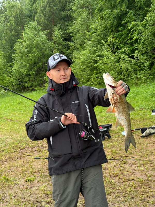 Angler displays catch in Ольховка, Russia