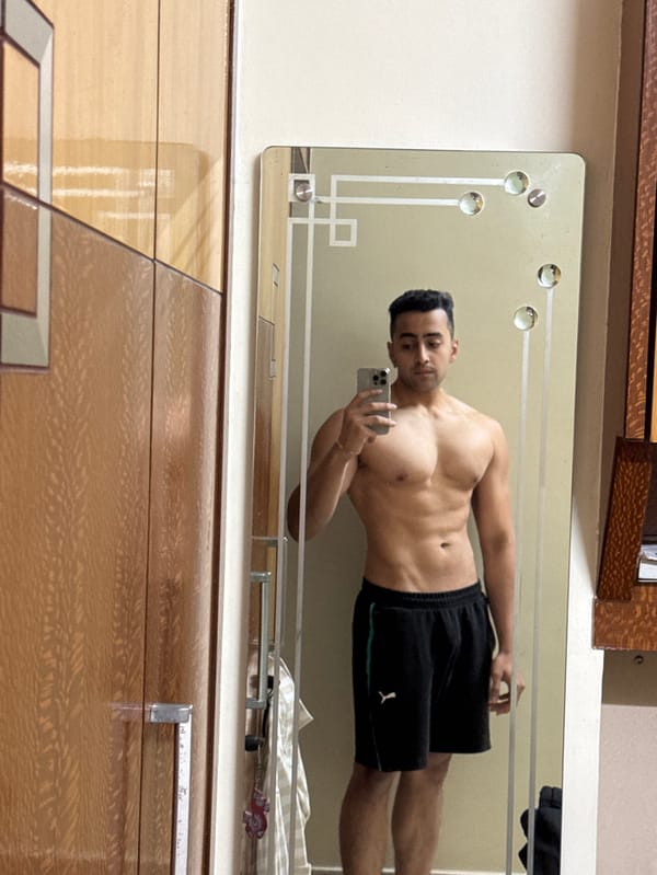 Young man documents afternoon mirror selfie session in Kolkata residence