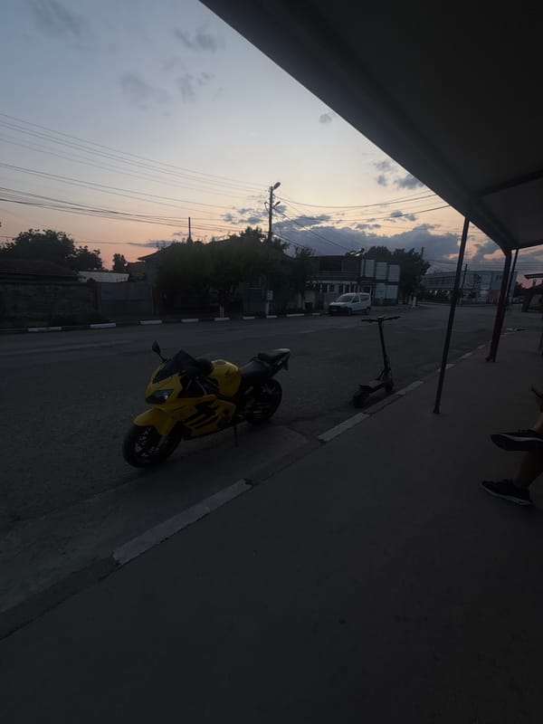 Yellow Honda CBR parked at dusk on a Marten street