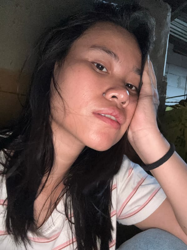 Selfie session in a dim East Jakarta room, various expressions