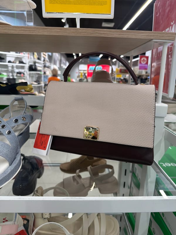 Browsing bags and shoes across a multi-level mall