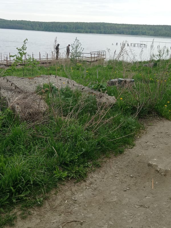 Early morning lakeside activities documented in Degtyarsk, Russia