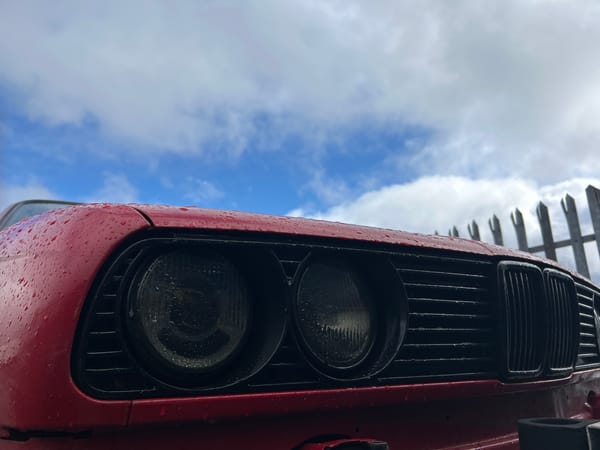 Red car towed in Shotts industrial area