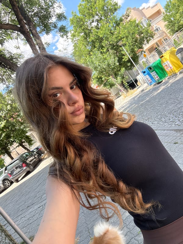 Selfies and a Pomeranian on a Plovdiv sidewalk