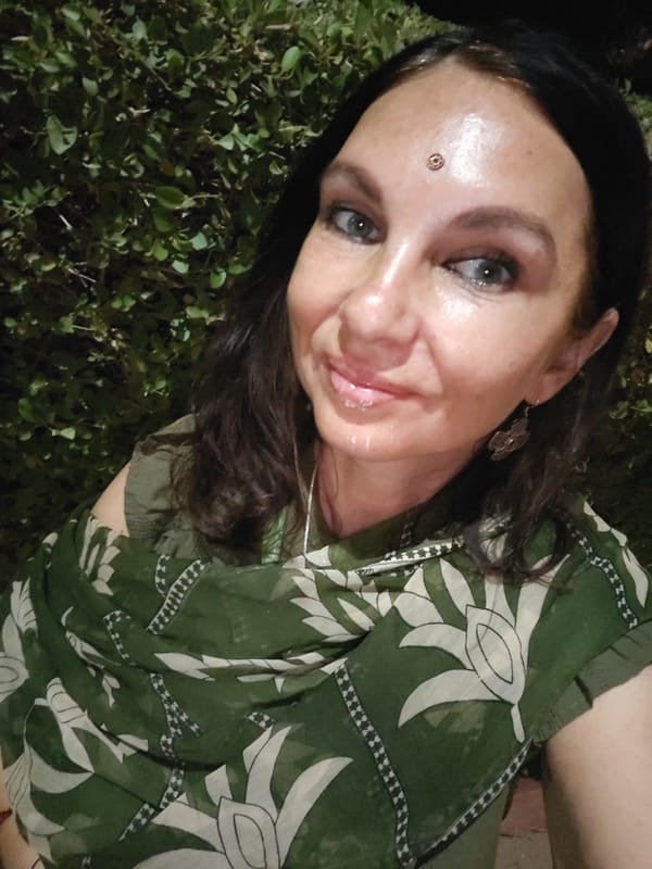 Woman in traditional attire observed in Puttaparthi, India