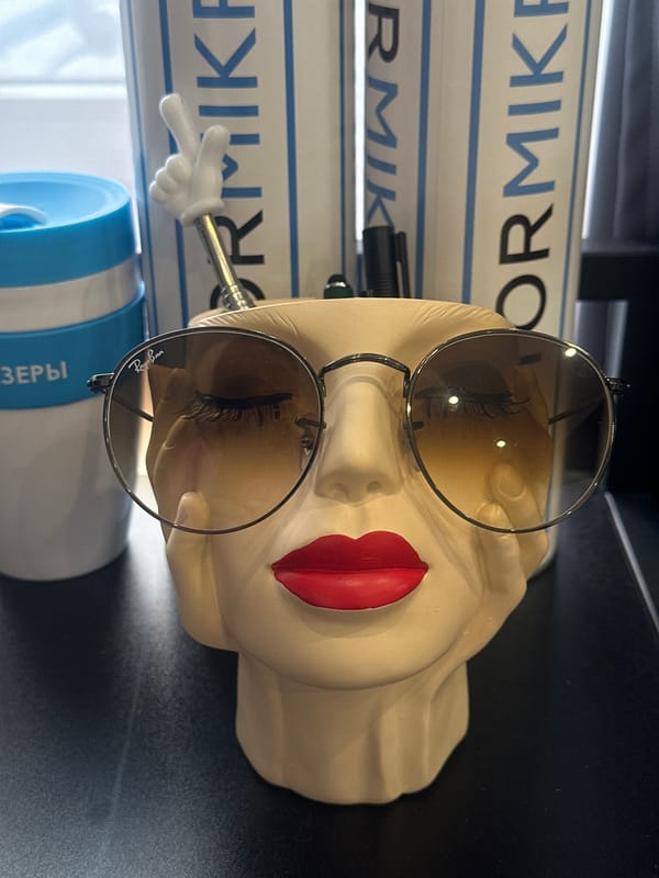 Woman takes morning selfies with pink accessories in Riga