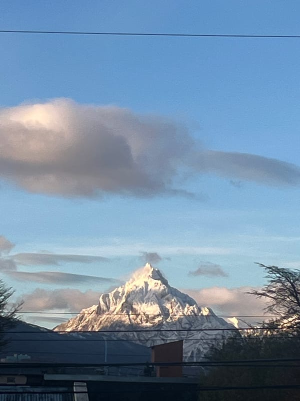 Sunlit snow-capped peaks viewed from Ushuaia, Argentina