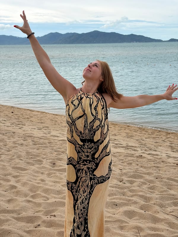 Overcast beach day on Ko Samui with swimwear, beanbags, and water