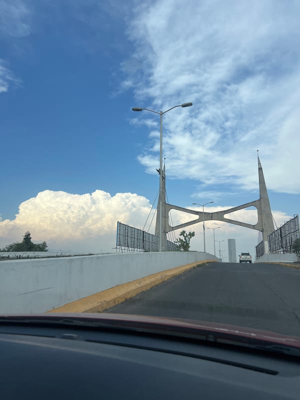 Driver observes cloud formations near Tlaxcalancingo bridge