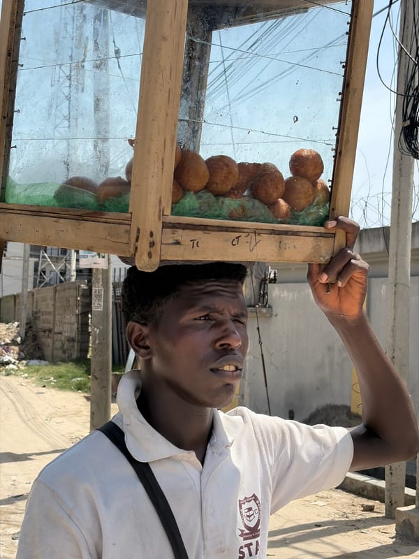 Daily commerce and street scenes documented across Nigerian towns