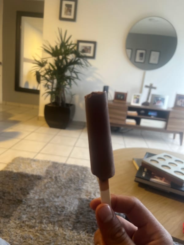 Late-night chocolate popsicle consumed in Mexico City home