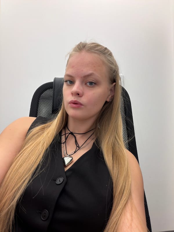 Woman takes early morning selfies in Izhevsk office setting